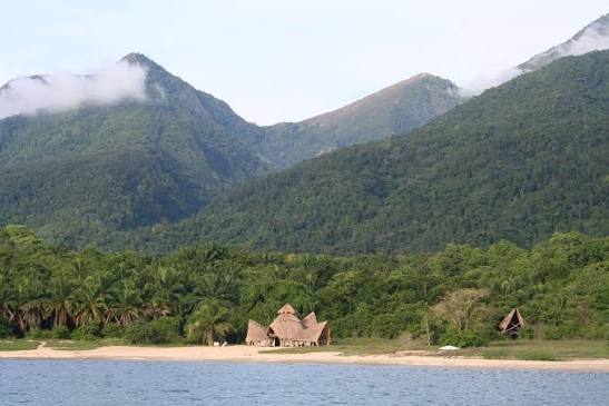 scenis view of a moutain range covered in light mist during a beautiful landscape safari in Tanzania