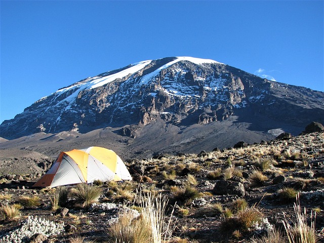Camping tent on the slopes of mount Kilimanjaro during a trekking tour in Tanzania